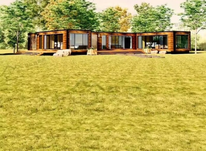 Modern prefab modular container home with large glass windows and outdoor deck