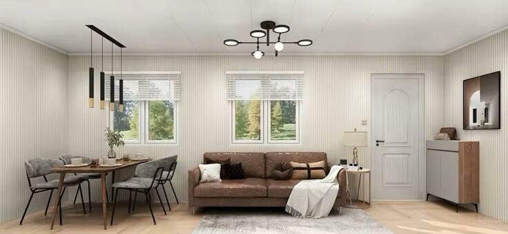 Modern two-story shipping container home with large windows and outdoor deck.