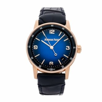 Audemars Piguet watch with blue dial and black leather strap