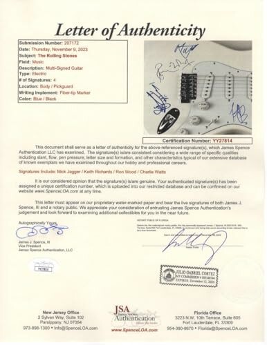 Letter of authenticity for a signed guitar with multiple signatures.