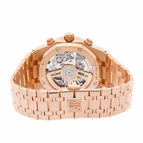 Back view of a luxury rose gold watch with visible mechanism.