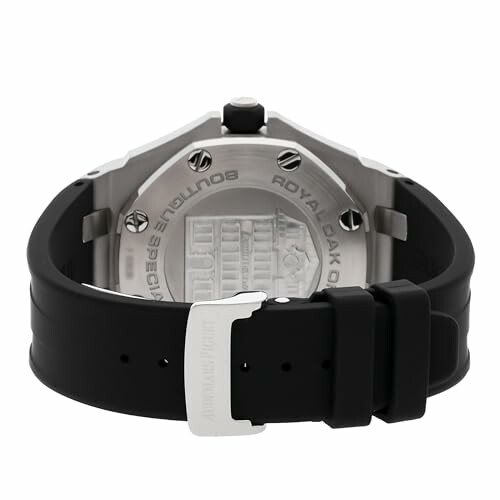 Back view of a luxury watch with a black strap.