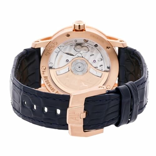 Back view of a luxury watch with leather strap and visible movement.