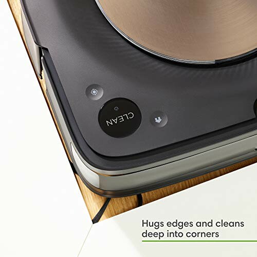 Robot vacuum cleaner cleaning along edges and corners.
