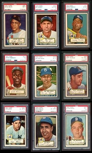 Collection of vintage baseball cards in protective cases.